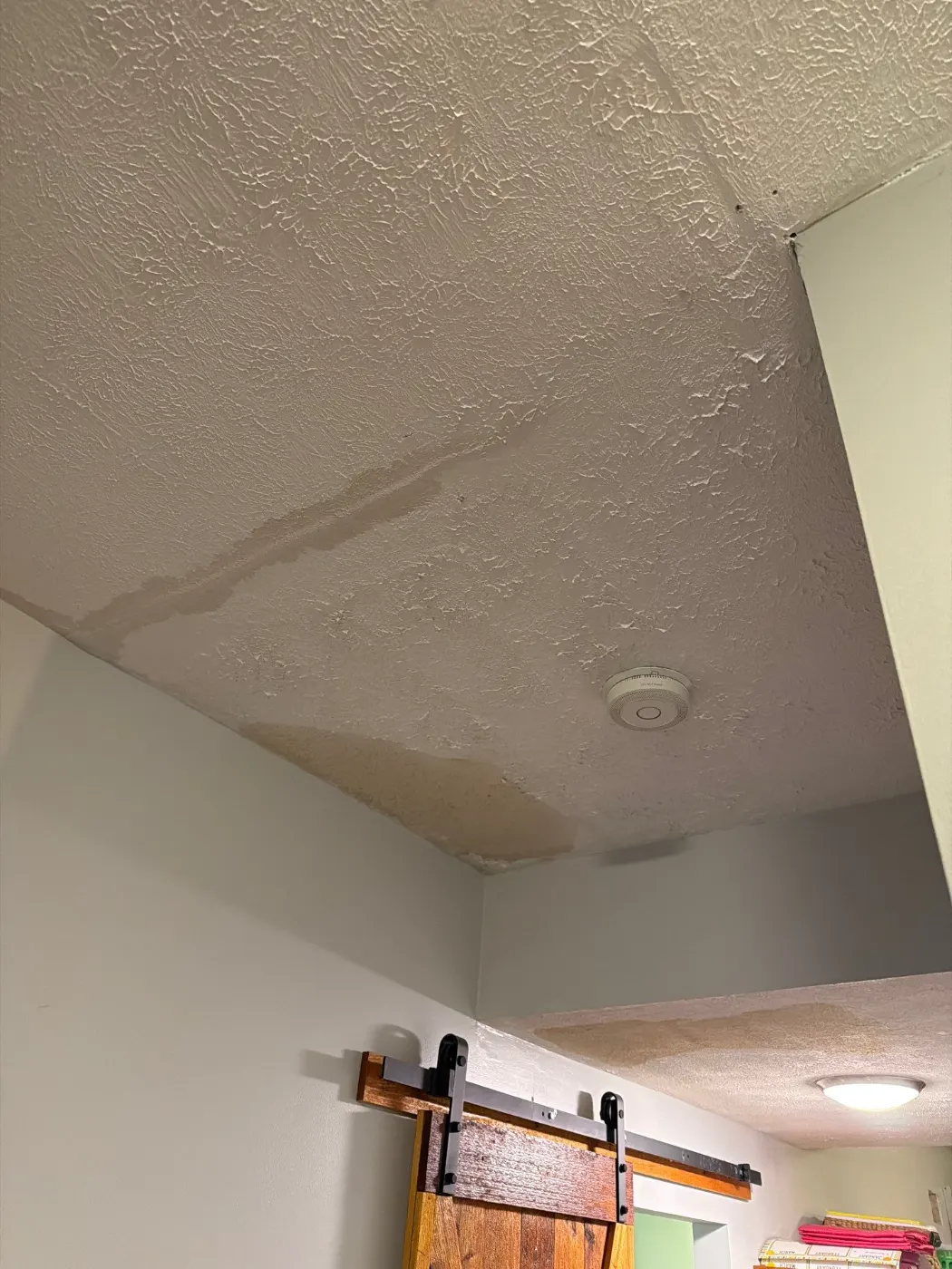 Moisture meter reading on drywall in Heritage Lake water loss